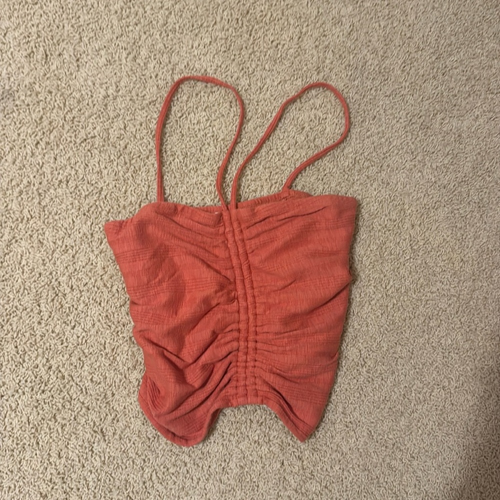 Pilcro size small tank top. Color is orange.